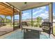 Screened patio showcasing comfortable seating, an outdoor fire pit, and an airy screened enclosure at 5043 Baileys Run Dr, Rock Hill, SC 29732