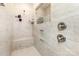 Tiled shower with a built-in seat and alcove for toiletries at 5043 Baileys Run Dr, Rock Hill, SC 29732