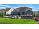 Outdoor oasis with a luxurious patio, outdoor bar, hot tub, and artificial turf for easy maintenance at 5050 Havencrest Dr, Fort Mill, SC 29715