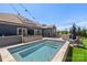 Stunning backyard pool and patio with ample lounge seating and outdoor grilling area perfect for entertaining at 5050 Havencrest Dr, Fort Mill, SC 29715