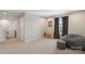 Comfortable bedroom featuring neutral tones, a beanbag chair, and a built-in shelf at 5050 Havencrest Dr, Fort Mill, SC 29715