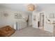 Adorable Bedroom with whimsical giraffe decor, a changing table, and ample space, perfect for a growing Gathering at 5050 Havencrest Dr, Fort Mill, SC 29715