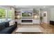 Inviting living room with a fireplace and built-in shelving, perfect for relaxing and entertaining at 5050 Havencrest Dr, Fort Mill, SC 29715