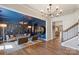 Elegant living room showcasing stylish furnishings, hardwood floors, and modern lighting fixtures at 5050 Havencrest Dr, Fort Mill, SC 29715