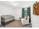 Cozy bedroom featuring soft carpet and comfortable decor at 507 Newsome Rd, Salisbury, NC 28146