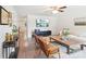 Cozy living room with a large TV, hardwood floors, comfortable seating, and natural light for a relaxing atmosphere at 507 Newsome Rd, Salisbury, NC 28146