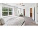Inviting main bedroom with lots of natural light and doorways to the closet and ensuite at 507 Newsome Rd, Salisbury, NC 28146