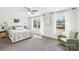 Bright main bedroom featuring large windows, neutral tones, and comfortable carpet at 507 Newsome Rd, Salisbury, NC 28146