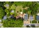 An aerial view showcasing the neighborhood, surrounding trees and the home's location at 522 Alexander St, Statesville, NC 28677