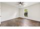 Bedroom featuring hardwood floors, a ceiling fan and window offering natural light at 522 Alexander St, Statesville, NC 28677