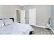 Bedroom with neutral walls, wood look floors, and guitar in the corner at 5333 Lake Glenn Dr, Stanfield, NC 28163