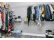 Walk-in closet with white shelving and storage space at 5333 Lake Glenn Dr, Stanfield, NC 28163