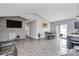 Open concept area blending living, dining, and kitchen spaces, complete with luxury vinyl plank flooring at 5333 Lake Glenn Dr, Stanfield, NC 28163