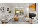 Cozy living room with a fireplace, stylish decor, and sliding glass doors leading to the backyard at 5615 Lantana Ave # A, Charlotte, NC 28205