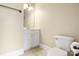 Bright bathroom with a white vanity and a toilet at 6011 Nw Village Nw Dr, Concord, NC 28027