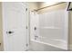 Bathroom area with a white shower/tub combo at 6011 Nw Village Nw Dr, Concord, NC 28027