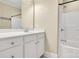 Bathroom area with a white vanity and a shower/tub combo at 6011 Nw Village Nw Dr, Concord, NC 28027