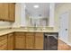 Kitchen featuring granite countertops, stainless steel appliances, and an open view to the living area at 6011 Nw Village Nw Dr, Concord, NC 28027