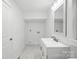 Bathroom with a bright vanity, modern finishes, and additional storage space at 615 & 625 Irish Potato Rd, Concord, NC 28025