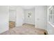 Clean bedroom with carpet, with natural light, multiple windows and closets at 615 & 625 Irish Potato Rd, Concord, NC 28025