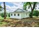 Charming exterior view of the house showcasing its classic design and well-maintained landscaping at 615 & 625 Irish Potato Rd, Concord, NC 28025