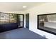 Inviting screened porch with space for entertaining and views of the backyard and surrounding neighborhood at 615 & 625 Irish Potato Rd, Concord, NC 28025