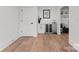 Mudroom with custom cabinets, beverage fridge and seating area for organizing your daily essentials at 621 Poindexter Dr, Charlotte, NC 28209