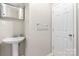 Bathroom with a pedestal sink, medicine cabinet, and a towel bar at 6256 Monford Dr, Conover, NC 28613