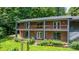 Exterior of a brick house with a wood deck and a patio at 6256 Monford Dr, Conover, NC 28613
