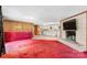Spacious living area flowing into an open kitchen featuring a brick fireplace and access to dining spaces at 6256 Monford Dr, Conover, NC 28613