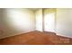 This is a bedroom that features two doors and nice warm carpeting at 640 Yellow Birch Dr, Locust, NC 28097