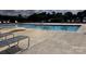 Community swimming pool with lounge chairs at 640 Yellow Birch Dr, Locust, NC 28097