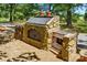 Outdoor brick oven/grill combination with stone accents, for outdoor cooking at 7204 E 218 Hwy, Marshville, NC 28103