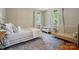 Inviting bedroom with twin beds, a soft rug, and natural lighting at 7204 E 218 Hwy, Marshville, NC 28103