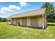 Long outbuilding with multiple access doors providing functionality and storage at 7204 E 218 Hwy, Marshville, NC 28103