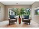 Bright sitting area with large windows, comfortable armchairs, and natural light at 7204 E 218 Hwy, Marshville, NC 28103