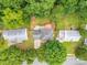 An aerial view of the property showcasing the home's location within a lush, green, and established neighborhood at 8120 Vermilion Dr, Charlotte, NC 28215