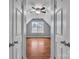 Bedroom featuring vaulted ceiling, hardwood floors and a window at 8120 Vermilion Dr, Charlotte, NC 28215