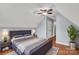 Bedroom featuring vaulted ceiling, hardwood floors and a modern bed at 8120 Vermilion Dr, Charlotte, NC 28215