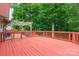 Large wooden deck with beautiful pergola perfect for outdoor entertaining or relaxing in a serene setting at 8120 Vermilion Dr, Charlotte, NC 28215