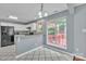 Eat-in kitchen features updated appliances and a beautiful window overlooking the deck at 8120 Vermilion Dr, Charlotte, NC 28215