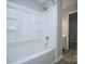 Bright bathroom with tile surround shower and tub combination at 8125 Sheringham Way, Charlotte, NC 28227