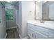 Bathroom featuring a sink, vanity, and shower at 8125 Sheringham Way, Charlotte, NC 28227