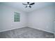 Bright bedroom featuring neutral paint, plush carpet and ceiling fan at 8125 Sheringham Way, Charlotte, NC 28227
