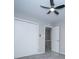 Bedroom featuring carpet, a ceiling fan and closet at 8125 Sheringham Way, Charlotte, NC 28227