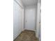 This home entryway has tile floors, a closet, and a white front door at 8125 Sheringham Way, Charlotte, NC 28227