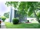 Charming two-story home with gray siding, manicured lawn, and mature trees at 8125 Sheringham Way, Charlotte, NC 28227