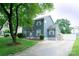 Attractive two-story home with neat landscaping, concrete driveway and gray exterior at 8125 Sheringham Way, Charlotte, NC 28227