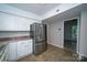 Kitchen featuring white cabinets, stainless steel refrigerator, and modern countertops at 8125 Sheringham Way, Charlotte, NC 28227