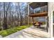 Outdoor living space featuring a patio, deck, and lush backyard, perfect for entertaining at 840 Pecan Tree Ln, Fort Mill, SC 29715
